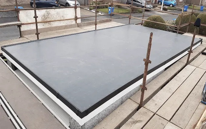 Completed EPDM rubber flat roof on a house extension