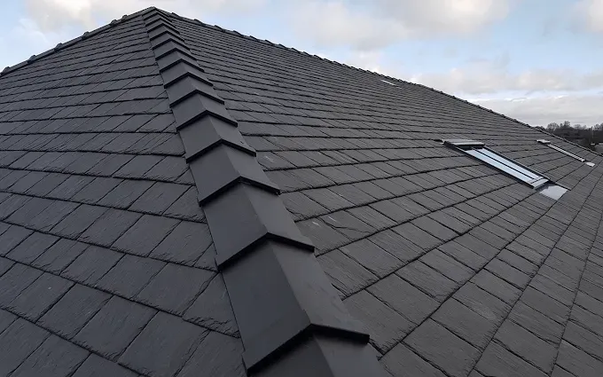 New slate tile roof fitted on a British semi-detached house